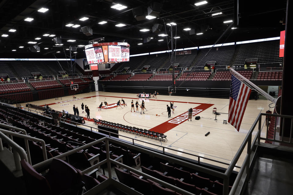 Gonzaga warms up in an empty stadium before an NCAA college basketball game against Stanford, Sunday, Jan. 9, 2022, in Stanford, Calif. (AP Photo/Josie Lepe)