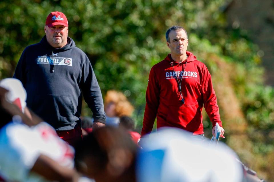 Freddie Kitchens and Shane Beamer at South Carolina’s practice Tuesday, Dec. 27, 2022 at Episcopal School of Jacksonville in preparation for the Gator Bowl.