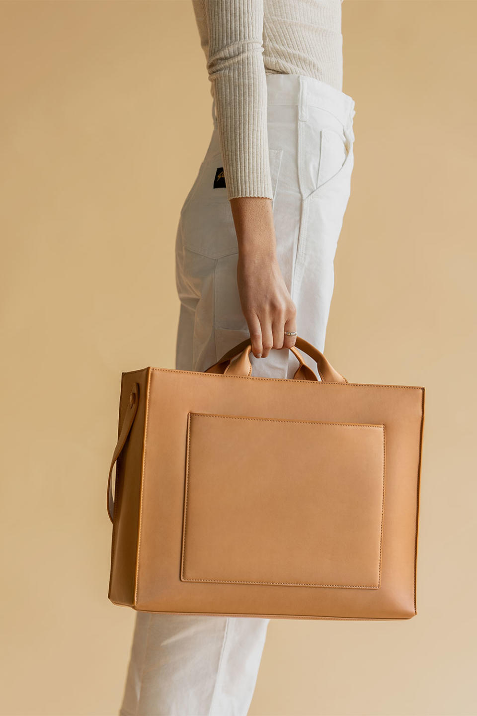 <p>Dagne Dover, the bag line famous for its <a href="https://people.com/travel/people-travel-awards-2019-the-best-bags-accessories-and-apps-of-the-year/?slide=7063695#7063695" rel="nofollow noopener" target="_blank" data-ylk="slk:super-chic Neoprene designs;elm:context_link;itc:0;sec:content-canvas" class="link ">super-chic Neoprene designs</a>, is welcoming summer with a new range of useful and stylish totes!</p> <p>The "New Vibrations" collection includes three styles: the <a href="https://www.pntrac.com/t/8-12690-131940-249606?sid=PEOLaunchesWeLovePEOPLEEditorsFavoriteNewTravelItemsYouCanShopNowhchubbTraGal12304405202009I&url=https%3A%2F%2Fwww.dagnedover.com%2Fcollections%2Fdaily-tote%23Bone-Medium" rel="sponsored noopener" target="_blank" data-ylk="slk:Daily Tote;elm:context_link;itc:0;sec:content-canvas" class="link ">Daily Tote</a> (pictured), the <a href="https://www.pntrac.com/t/8-12690-131940-249606?sid=PEOLaunchesWeLovePEOPLEEditorsFavoriteNewTravelItemsYouCanShopNowhchubbTraGal12304405202009I&url=https%3A%2F%2Fwww.dagnedover.com%2Fcollections%2Flaila-cage-tote%23Pinto-Small" rel="sponsored noopener" target="_blank" data-ylk="slk:Laila Cage Tote;elm:context_link;itc:0;sec:content-canvas" class="link ">Laila Cage Tote</a> and the <a href="https://www.pntrac.com/t/8-12690-131940-249606?sid=PEOLaunchesWeLovePEOPLEEditorsFavoriteNewTravelItemsYouCanShopNowhchubbTraGal12304405202009I&url=https%3A%2F%2Fwww.dagnedover.com%2Fcollections%2Ftokyo-turnlock-tote%23VitaminC" rel="sponsored noopener" target="_blank" data-ylk="slk:Tokyo Turnlock Tote;elm:context_link;itc:0;sec:content-canvas" class="link ">Tokyo Turnlock Tote</a> — each with plenty of inside pockets, perfect for the organized traveler.</p> <p>The Daily Tote and the Laila Cage Tote are both made with vegan leather, while the Tokyo Turnlock Tote is made of genuine pebbled leather and has adjustable straps.</p> <p>Once commuting becomes the norm again, the Daily Tote is designed to lug stuff from home to office and everywhere in between. It's available in two different sizes (medium and large) and three different colors: Onyx, Bone and Pinto (pictured).</p> <p><strong>Buy It!</strong> Daily Tote, Starting at $275; <a href="https://www.pntrac.com/t/8-12690-131940-249606?sid=PEOLaunchesWeLovePEOPLEEditorsFavoriteNewTravelItemsYouCanShopNowhchubbTraGal12304405202009I&url=https%3A%2F%2Fwww.dagnedover.com%2Fcollections%2Fdaily-tote%23Pinto-Medium" rel="sponsored noopener" target="_blank" data-ylk="slk:dagnedover.com;elm:context_link;itc:0;sec:content-canvas" class="link ">dagnedover.com</a></p>