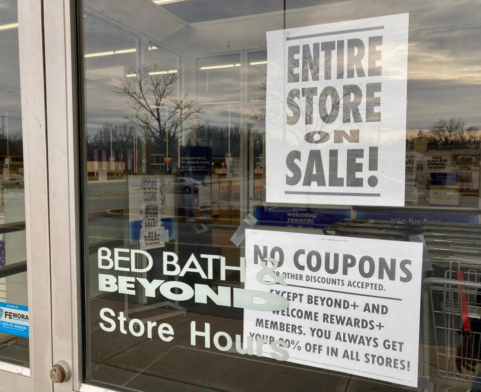 Signs on the door of the Bed Bath & Beyond store on Garland Groh Boulevard in Hagerstown on Thursday morning advertise a storewide sale. The beleaguered company announced late Wednesday that the Washington County, Md., store would be among 150 to close as part of a plan to help stave off bankruptcy.