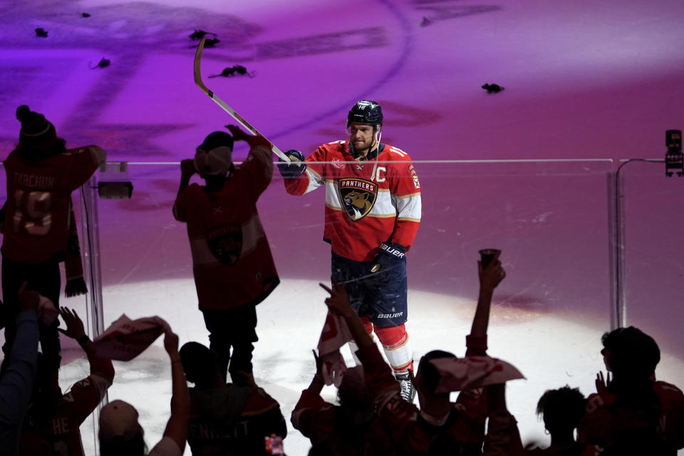 Florida Panthers center Aleksander Barkov (16) passes his stick to a fan after the Panthers defeated the Boston Bruins in Game 2 of a second-round series of the NHL hockey Stanley Cup playoffs Wednesday, May 8, 2024, in Sunrise, Fla. (AP Photo/Lynne Sladky)