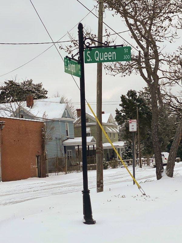 Snow blankets the intersection of South Queen and Bright streets in Kinston on Saturday morning.