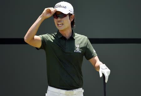 Kevin Na tips his cap to the crowd on the 1st tee during the final round of The Players Championship at TPC Sawgrass - Stadium Course. Mandatory Credit: John David Mercer-USA TODAY Sports