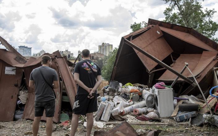 Resident civilians inspect the area near by a kindergarten struck by a missile attack following explosions in a neighborhood in north of Kyiv,&nbsp; - Anadolu Agency&nbsp;