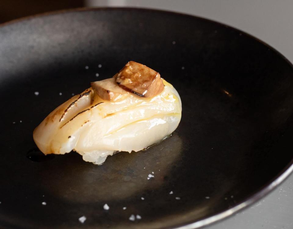 Seared scallop nigiri with foie gras.