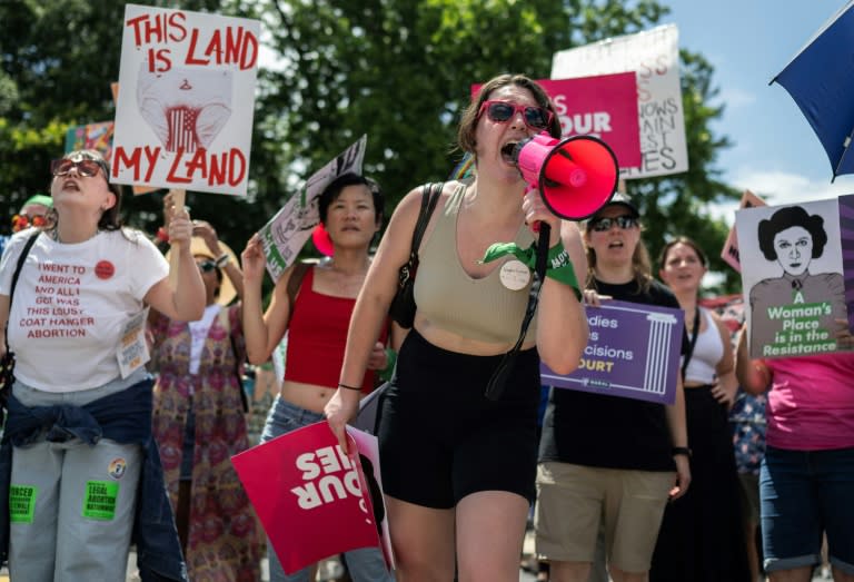 Abortion rights demonstrators rally to mark the first anniversary of the US Supreme Court ruling in the Dobbs v Women's Health Organization case in Washington, DC on June 24, 2023 (ANDREW CABALLERO-REYNOLDS)