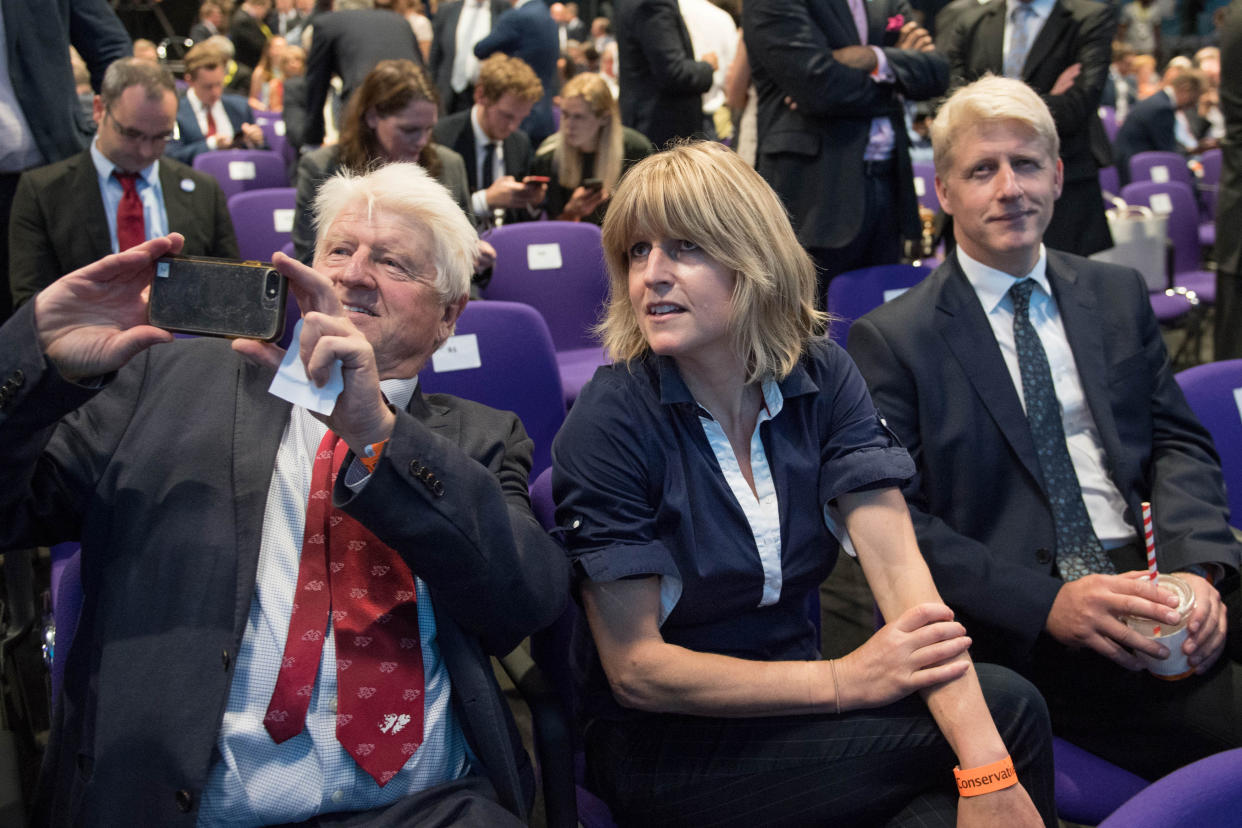 LONDON, ENGLAND - JULY 23: Boris's father Stanley Johnson, sister Rachel Johnson and brother Jo Johnson react after Boris Johnson is elected as the new leader of the Conservative Party and British Prime Minister during the Conservative Leadership announcement at the QEII Centre on July 23, 2019 in London, England. After a month of hustings, campaigning and televised debates the members of the UK's Conservative and Unionist Party have voted for Boris Johnson to be their new leader and the country's next Prime Minister, replacing Theresa May. (Photo by Stefan Rousseau - WPA Pool/Getty Images)