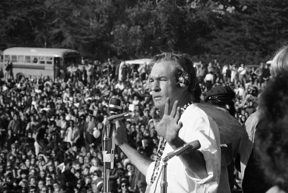FILE - In this Jan. 14, 1967, file photo, Timothy Leary addresses a crowd of hippies at the "Human Be-In" that he helped organize in Golden Gate Park, San Francisco, Calif. Leary told the crowd to "Turn on, Tune in and Drop out". The event was a prelude to the "Summer of Love", which brought the hippie experience into the American mainstream. City officials have rejected a permit for a planned free concert intended to mark the 50th anniversary of the famed Summer of Love in Golden Gate Park that had been planned for June. (AP Photo/Bob Klein, File)