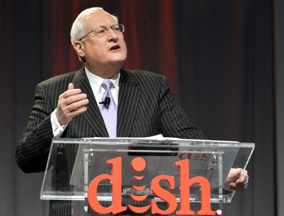 Dish president and CEO Joe Clayton talks to the media during the Dish news conference at the International Consumer Electronics Show Monday, Jan. 6, 2014, in Las Vegas. (AP Photo/Jack Dempsey)