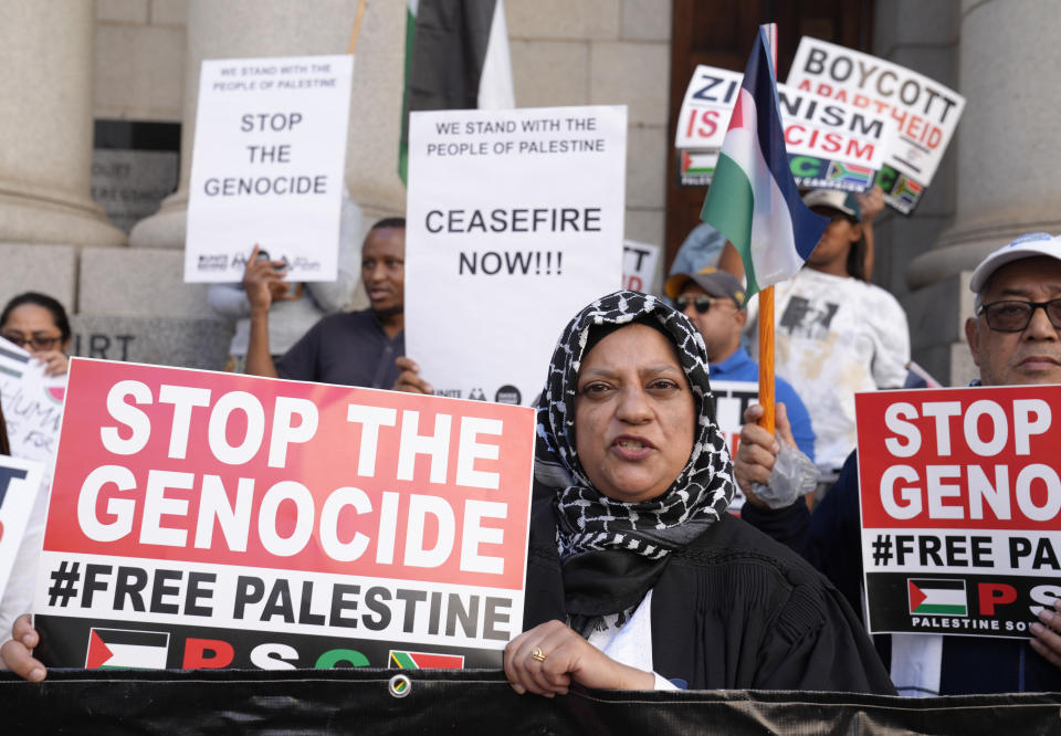 FILE - Pro-Palestinian supporters picket outside the High Court in Cape Town, South Africa, Thursday, Jan. 11, 2024. South Africa’s genocide case against Israel opened last week at the International Court of Justice at The Hague. (AP Photo/Nardus Engelbrecht, File)