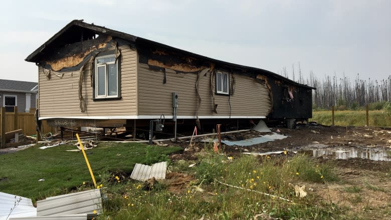 Dog wakes owner before Alberta home burns down — again