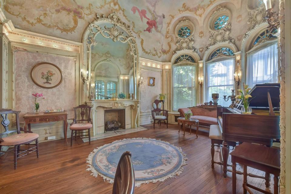 Music room with a 20-foot high domed ceiling at 1089 Iroquois.