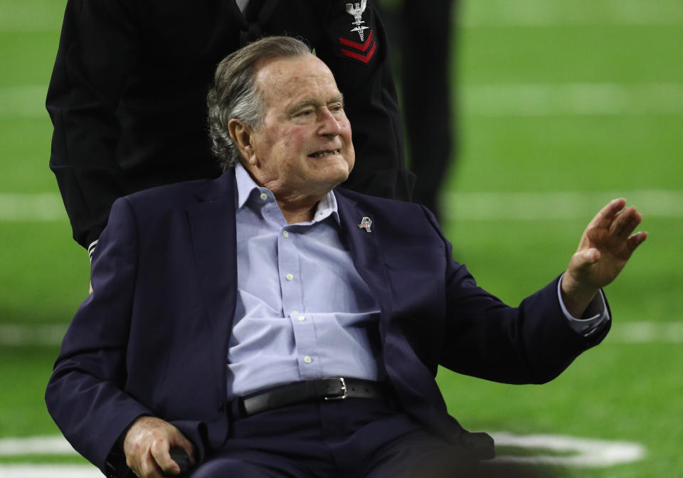 President George H.W. Bush arrives for the coin toss prior to Super Bowl 51 between the Atlanta Falcons and the New England Patriots at NRG Stadium on February 5, 2017 in Houston, Texas.