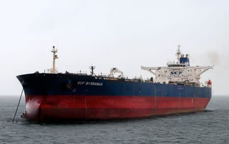 The oil tanker SCF Byrranga, which was renamed the United Kalavryta in March 2014 (also known as United Kalavrvta) and is currently off the coast of Texas with a cargo of Kurdish crude oil, is seen off the Isle of Arran, Scotland in this handout photo taken February 21, 2014. REUTERS/Tom Duncan/Handout via Reuters