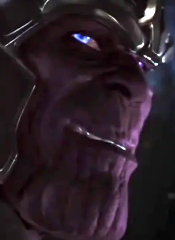 Close-up of Thanos, a character from the Marvel Cinematic Universe, wearing his helmet and showing his facial expression