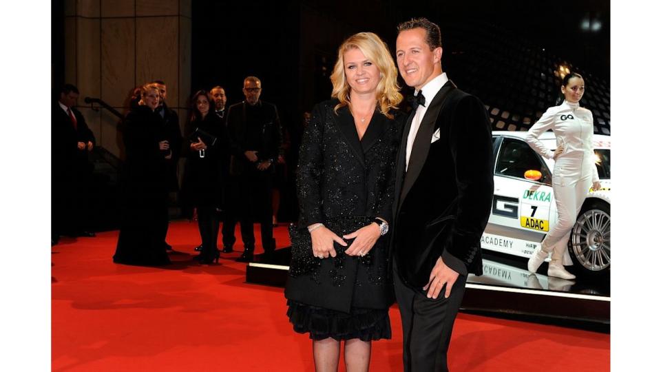 Michael Schumacher and wife Corinna Schumacher attend the GQ Men Of The Year 2010 award ceremony at Komische Oper on October 29, 2010 in Berlin, Germany.