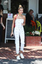 <p>Hailey Baldwin wore a $350 floral embroidered set with its rope belt from the designer while out in Los Angeles. (Photo: AKM-GSI) </p>