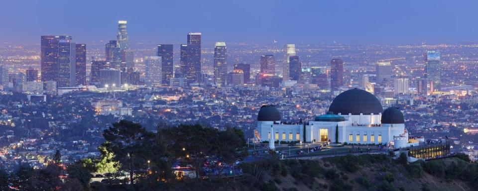 A view of the Griffith Observatory, with downtown LA in the background (Getty Images)