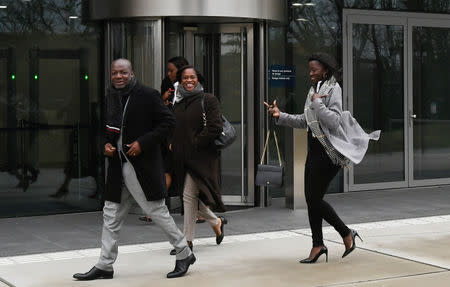 Former Ivory Coast President Laurent Gbagbo's twin daughters Marie Laurence and Marie Patrice walk past the International Criminal Court in The Hague, Netherlands, January 16, 2019. REUTERS/Piroschka van de Wouw