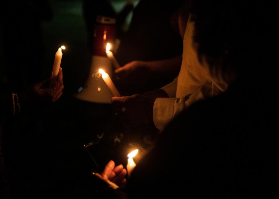 A vigil was held Monday night, Oct. 25, 2021, outside Streets Ministries following a shooting that injured three children Monday afternoon.