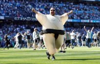 <p>Soccer Football – Premier League – Manchester City vs Huddersfield Town – Etihad Stadium, Manchester, Britain – May 6, 2018 Manchester City fans celebrate winning the premier league on the pitch after the end of the match Action Images via Reuters/Carl Recine EDITORIAL USE ONLY. No use with unauthorized audio, video, data, fixture lists, club/league logos or “live” services. Online in-match use limited to 75 images, no video emulation. No use in betting, games or single club/league/player publications. Please contact your account representative for further details. </p>