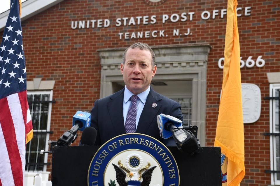 Rep. Josh Gottheimer speaks to reporters about actions he said should be taken to end mail fraud at the post office at 751 Palisade Ave. in Teaneck on Nov. 29.