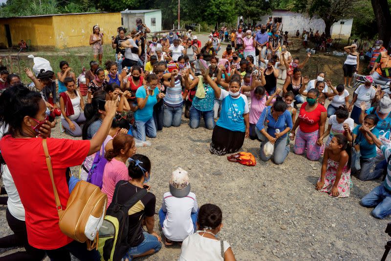 Relatives of inmates protest outside Los Llanos penitentiary after a riot erupted inside the prison leaving dozens of dead as the coronavirus disease (COVID-19) continues in Guanare