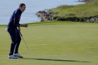 Team USA's Patrick Cantlay reacts after making a putt on the eighth hole during a foursomes match the Ryder Cup at the Whistling Straits Golf Course Saturday, Sept. 25, 2021, in Sheboygan, Wis. (AP Photo/Jeff Roberson)