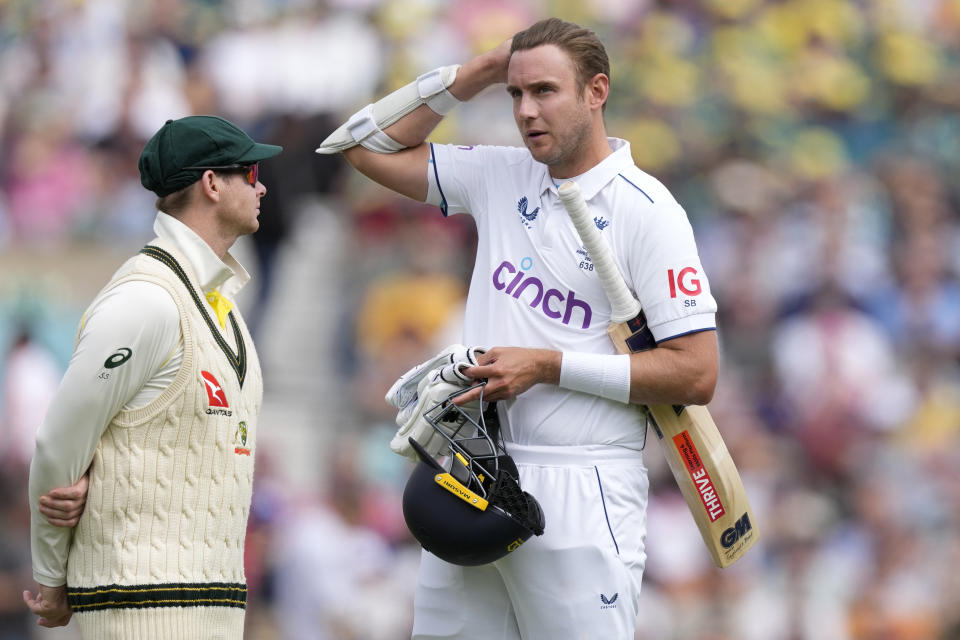 England's Stuart Broad, right, and Australia's Steven Smith watch a video review as England are bowled out for 395 on day four of the fifth Ashes Test match between England and Australia, at The Oval cricket ground in London, Sunday, July 30, 2023. (AP Photo/Kirsty Wigglesworth)