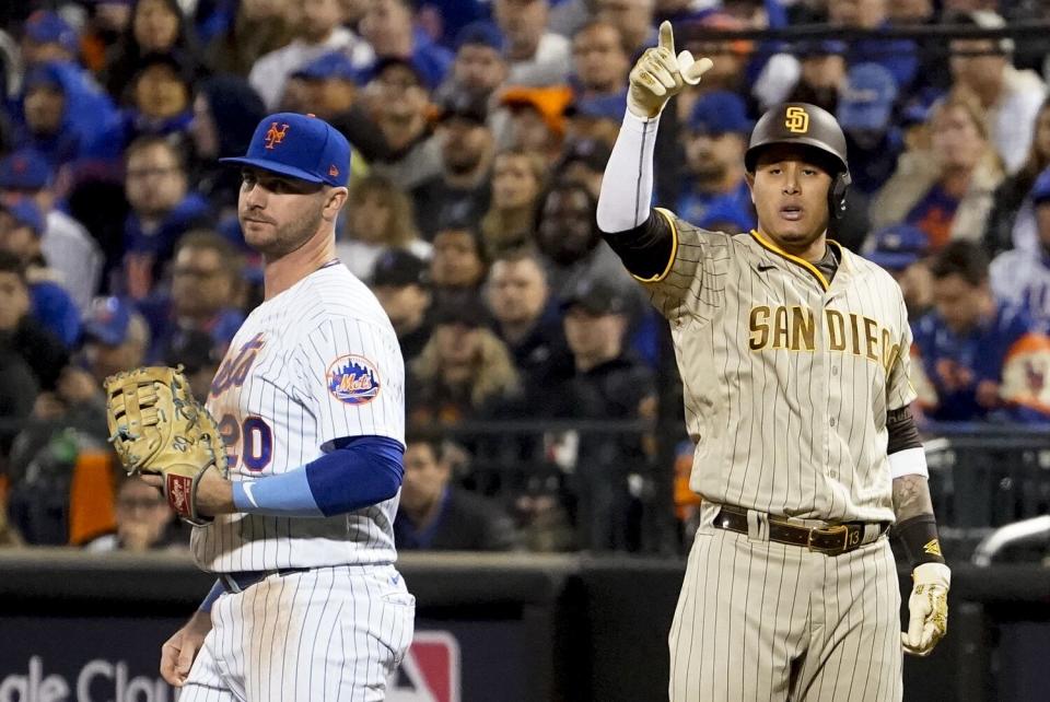 San Diego Padres third baseman Manny Machado reacts after driving in a run.