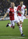 Slavia's Vladimir Coufal, left, jubilates after scoring his teams first goal during a Europa League soccer match between KRC Genk and Slavia Praha in Genk, Belgium, on Thursday, Feb. 21, 2019. (AP Photo/Olivier Matthys)