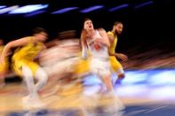 Jan 11, 2019; New York, NY, USA; New York Knicks forward Mario Hezonja (8) drives to the basket against Indiana Pacers forward Doug McDermott (20) and guard Cory Joseph (6) during the fourth quarter at Madison Square Garden. Mandatory Credit: Brad Penner-USA TODAY Sports