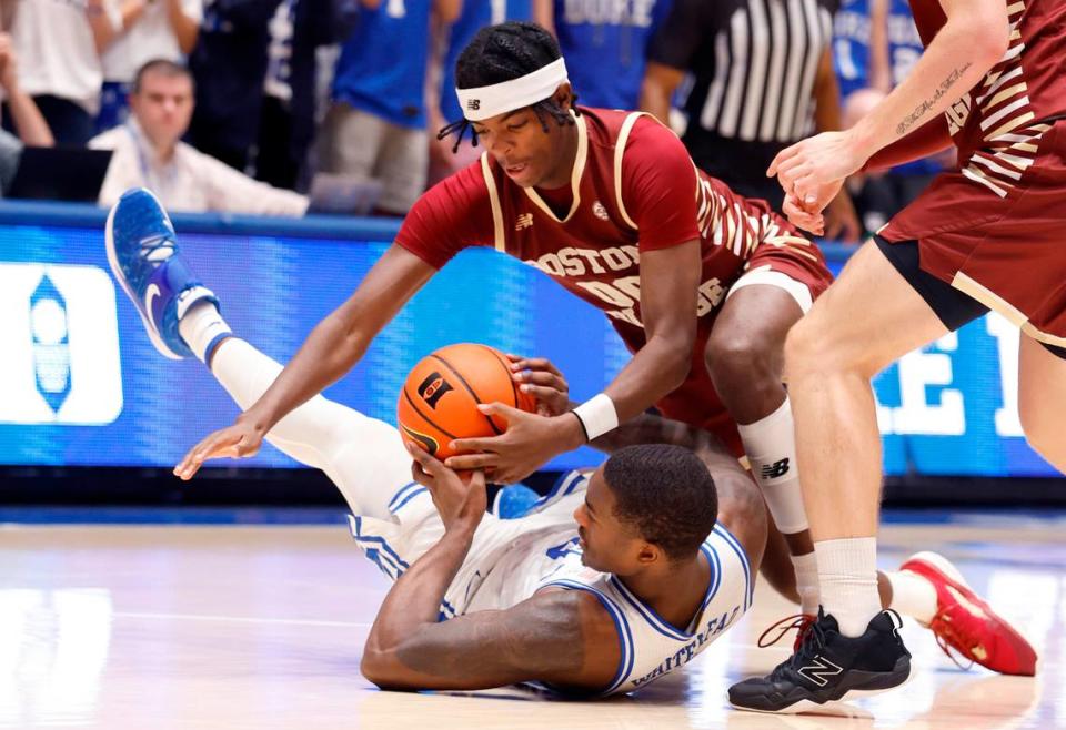 Duke’s Dariq Whitehead (0) pulls in the loose ball from Boston College’s Chas Kelley (00) during the second half of Duke’s 75-59 victory over Boston College at Cameron Indoor Stadium in Durham, N.C., Saturday, Dec. 3, 2022.