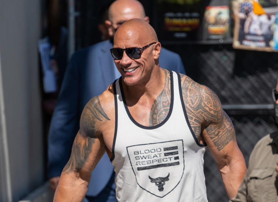 the rock walking outside