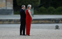 <p>British Prime Minster Theresa May and her husband Philip, wait to welcome President Donald Trump and first lady Melania Trump to Blenheim Palace, where they are attending a dinner with specially invited guests and business leaders, near Oxford, Britain, July 12, 2018. (Photo: Peter Nicholls/Reuters) </p>