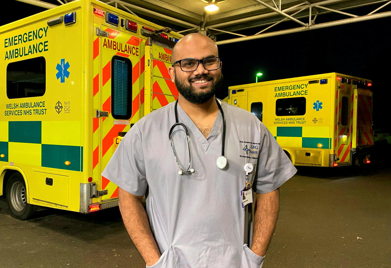 Inshad Ibrahim outside Wrexham Maelor Hospital.   ‘Is there a doctor on board’ heard Inshad Ibrahim, from Wrexham Maelor Hospital’s Emergency Department, before he found himself helping a woman, only seven-months pregnant, give birth on a plane thousands of feet in the sky. See SWNS story SWMDbirth.  Inshad, who lives in Wrexham, was travelling to Kochi, South India, with his wife and two children. After two hours on the flight Inshad heard the crew ask if there was a doctor on board who could help them. Inshad volunteered and was taken to a woman who was just seven months pregnant, who seemed in pain from the turbulence they were experiencing on the plane. Inshad said: “Other medical staff on the plane also volunteered to help, and when we examined the woman, we saw her waters had broken, and we told the crew that this was an emergency and we needed space.   “The cabin crew turned an area which they normally prepare the food in into a delivery room for us with pillows and clothes. When we examined her, half the head of the baby was already out. The baby was very small but she wasn’t making a sound, so I tapped his back and after about 15-20 seconds he opened his eyes and cried. The was a very long 15-20 seconds.”   The baby was named Shawn Michael and weighed 2.4lbs. The other passengers gave their clothes to keep the baby warm, as well as consoled the new father of Shawn, and helped Inshad’s wife care for their two children.  (SWNS)