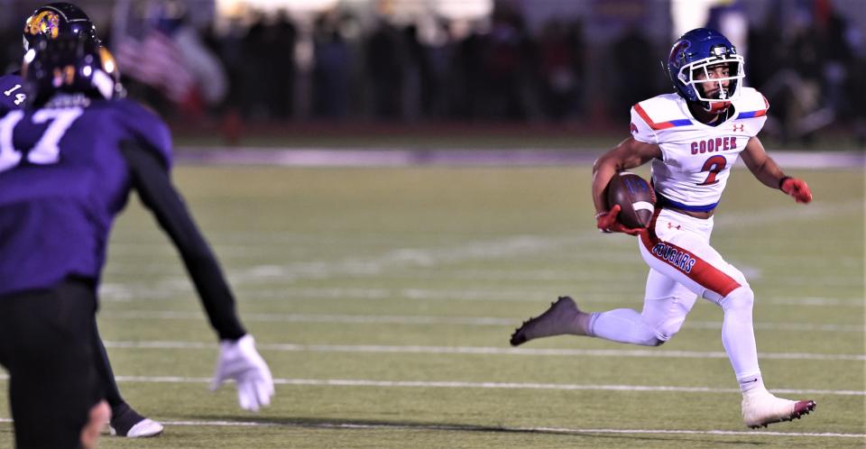 Cooper receiver Cam Herron (2) looks for running room after a catch against Wylie.