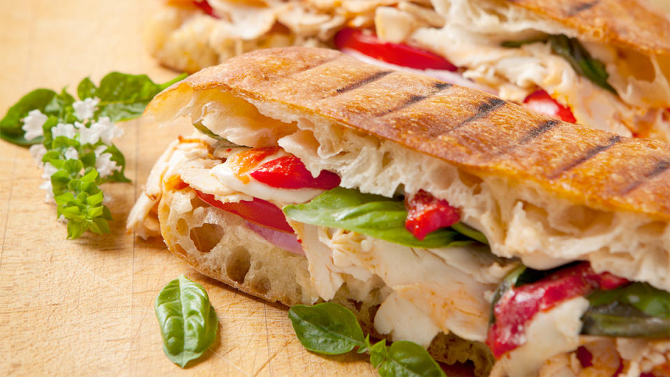 A recipe for Turkey and Fontina Paninis using sun dried tomato pesto