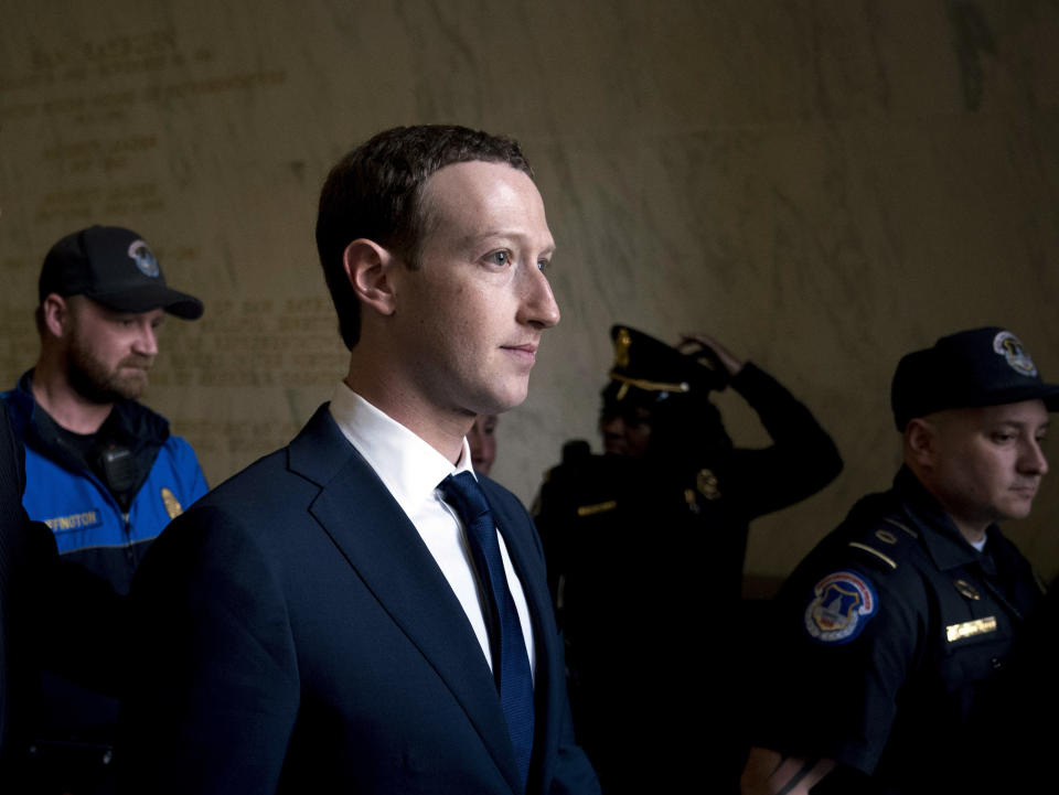 In this April 11, 2018, photo, Facebook CEO Mark Zuckerberg departs after testifying on Capitol Hill in Washington about the use of Facebook data to target American voters in the 2016 election and data privacy. (AP Photo/Andrew Harnik)