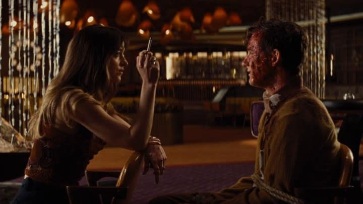 Dakota Johnson and Lewis Pullman in Bad Times At the El Royale.