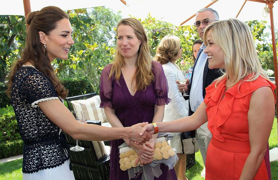 Kate Middleton and Reese Witherspoon shake hands