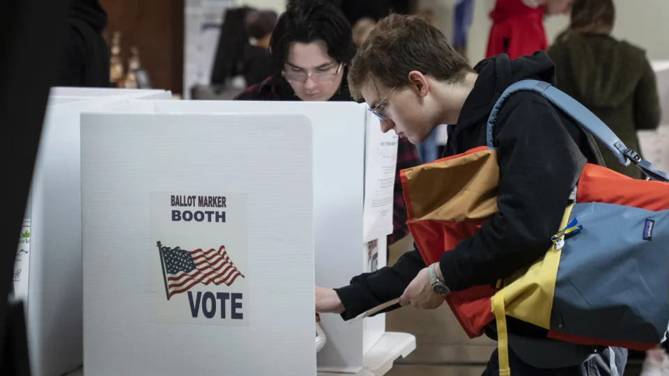 Voters fill out their ballots in voting booths at a polling location in Columbus, Ohio.