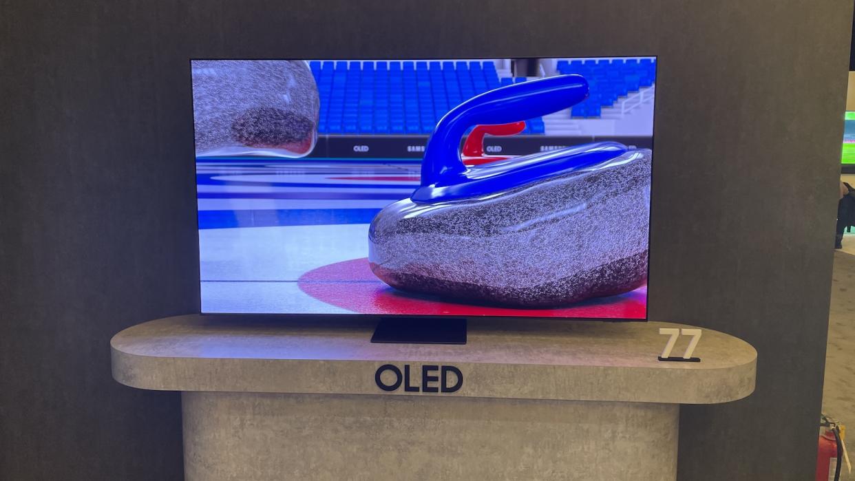  Samsung S95D QD-OLED on a marble stand. 