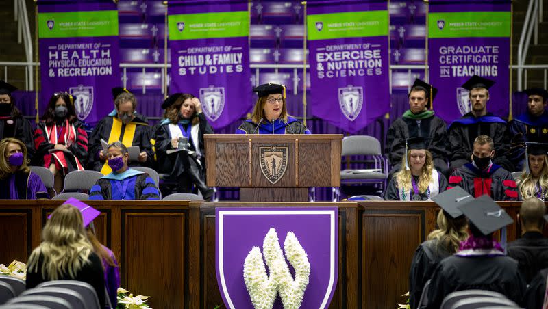 Kristin Hadley, dean of the Jerry & Vickie Moyes College of Education at Weber State University, speaks at the college’s commencement ceremonies at the Dee Events Center in Ogden on Dec. 17, 2021.
