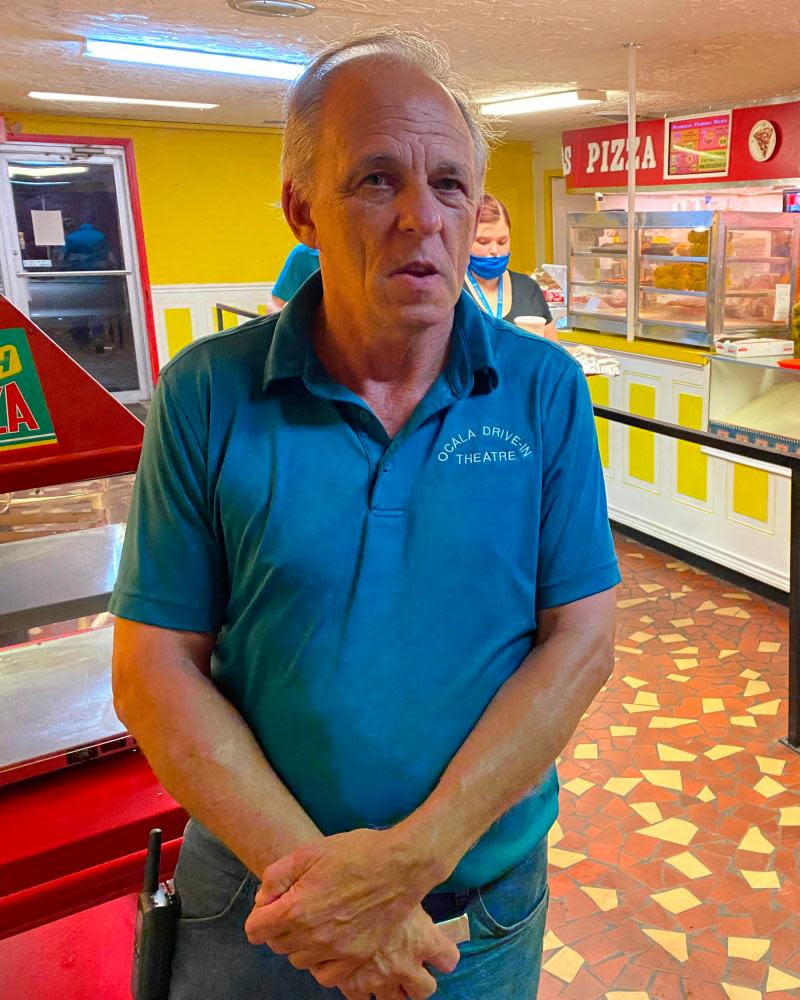 Owner John Watzke stands in the concession area at the Ocala drive-in theatre in Ocala, Florida.