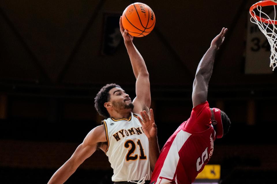 Noah Reynolds (left), a 6-foot-3 guard who scored 14.5 points per game for Wyoming as a freshman last season, has announced that he is transferring to Wisconsin for next season.