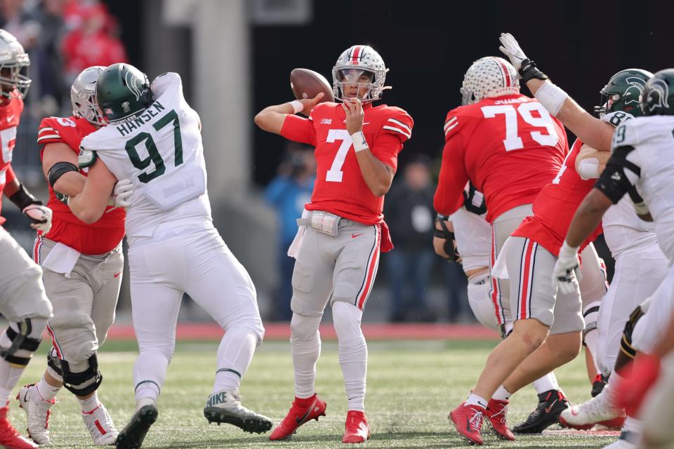 C.J. Stroud of the Ohio State Buckeyes throws a first-half pass while playing the Michigan State Spartans at Ohio Stadium on Nov. 20, 2021 in Columbus, Ohio.