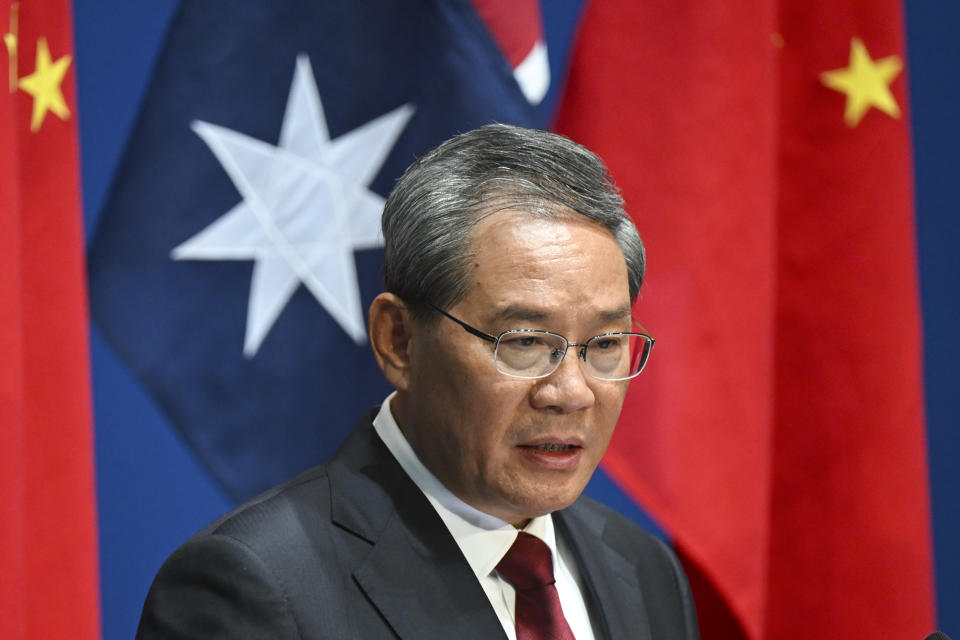 Chinese Premier Li Qiang speaks to the media during a signing ceremony at Parliament House in Canberra, Monday, June 17, 2024. (Lukas Coch/Pool Photo via AP)