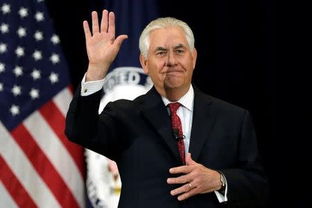 U.S. Secretary of State Rex Tillerson waves after delivering remarks to the employees at the State Department in Washington, U.S., May 3, 2017. REUTERS/Yuri Gripas