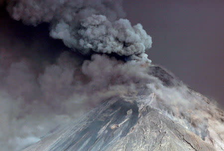 Steam rises from Fuego volcano (Volcano of Fire) as seen from San Juan Alotenango, outside of Guatemala City, Guatemala November 19, 2018. REUTERS/Luis Echeverria